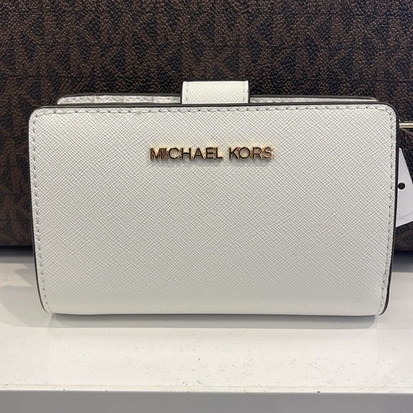 Michael Medium Crossgrain Leather Bifold Wallet
Optic White
NWT - Picture 14 of 16